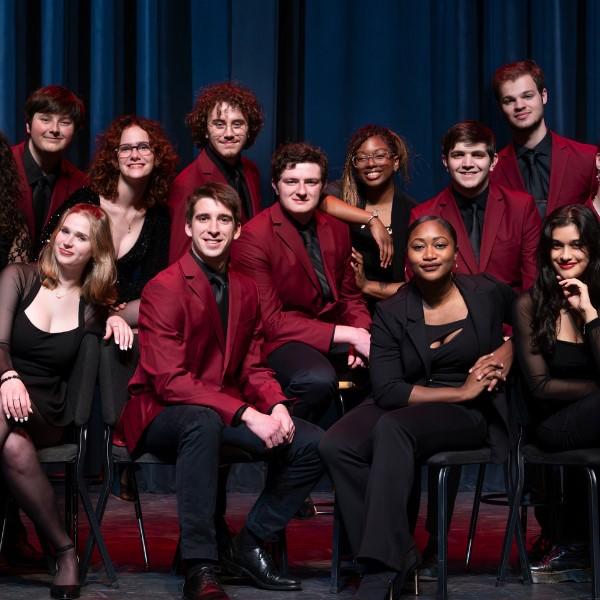 Mason Jazz Vocal Night singers dressed in crimson and black